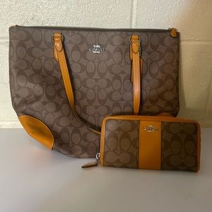 Like new orange and tan coach purse with matching wallet
